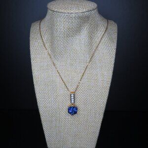 Gold Tone Necklace with Blue Stone and Clear Crystal Pendant
